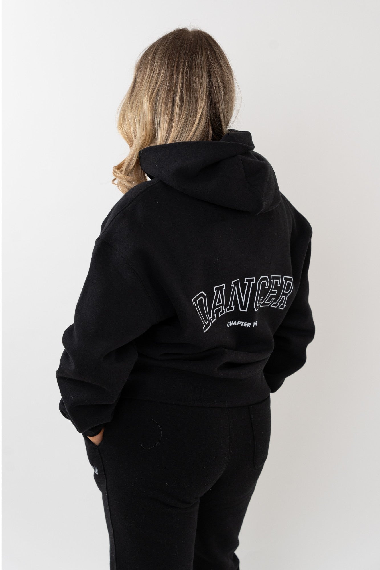 back view of chapter 19 black hoodie for dancers