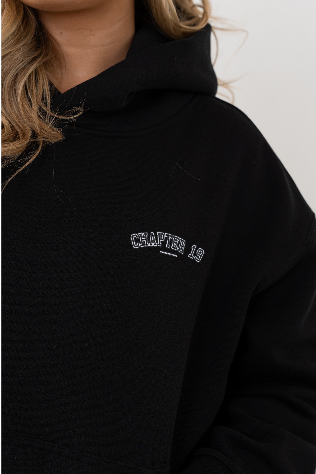 streetwear stye black hoodie with bold dancer logo