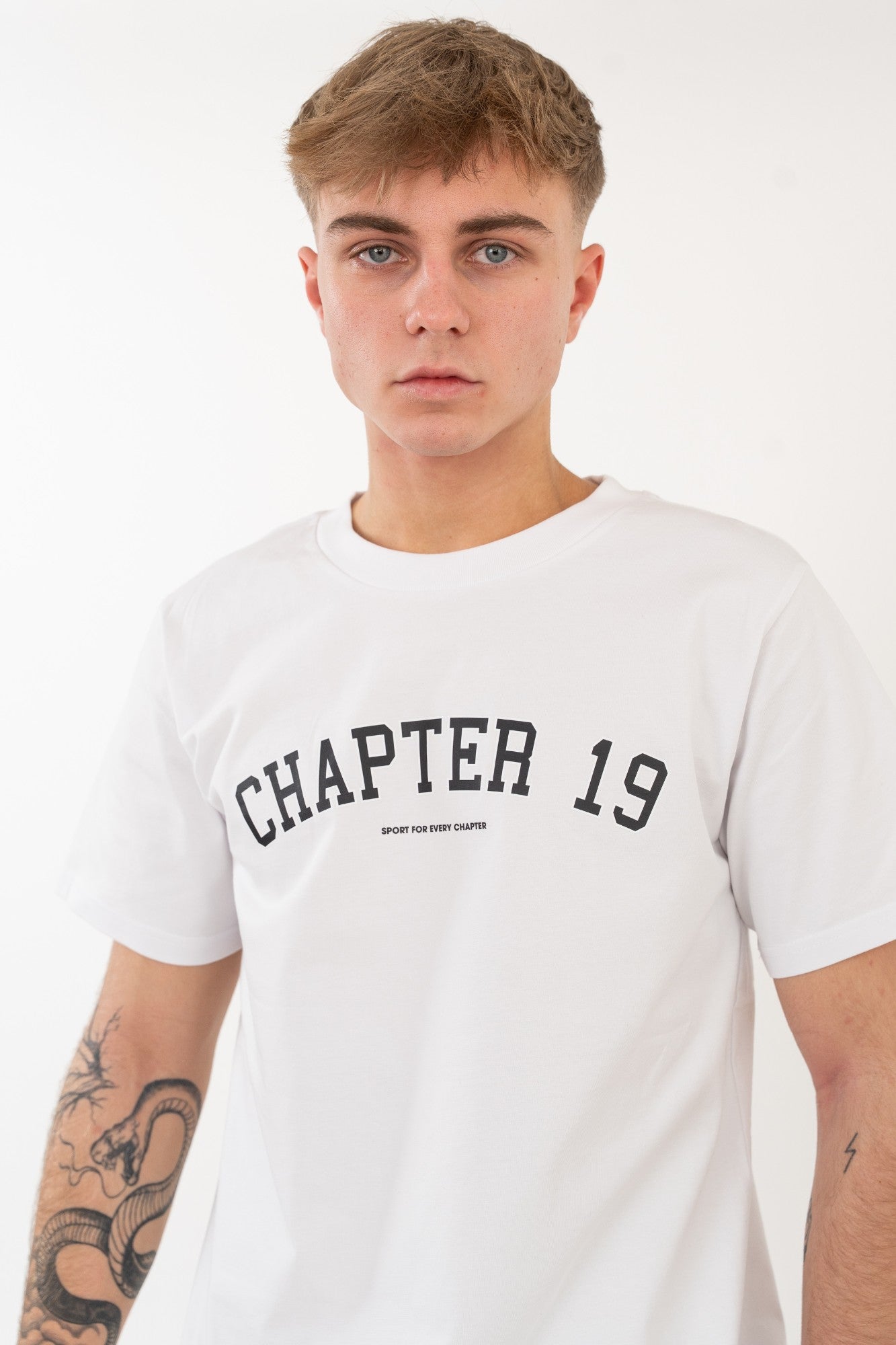 front view of white chapter 19 mens tshirt detail for essential wear