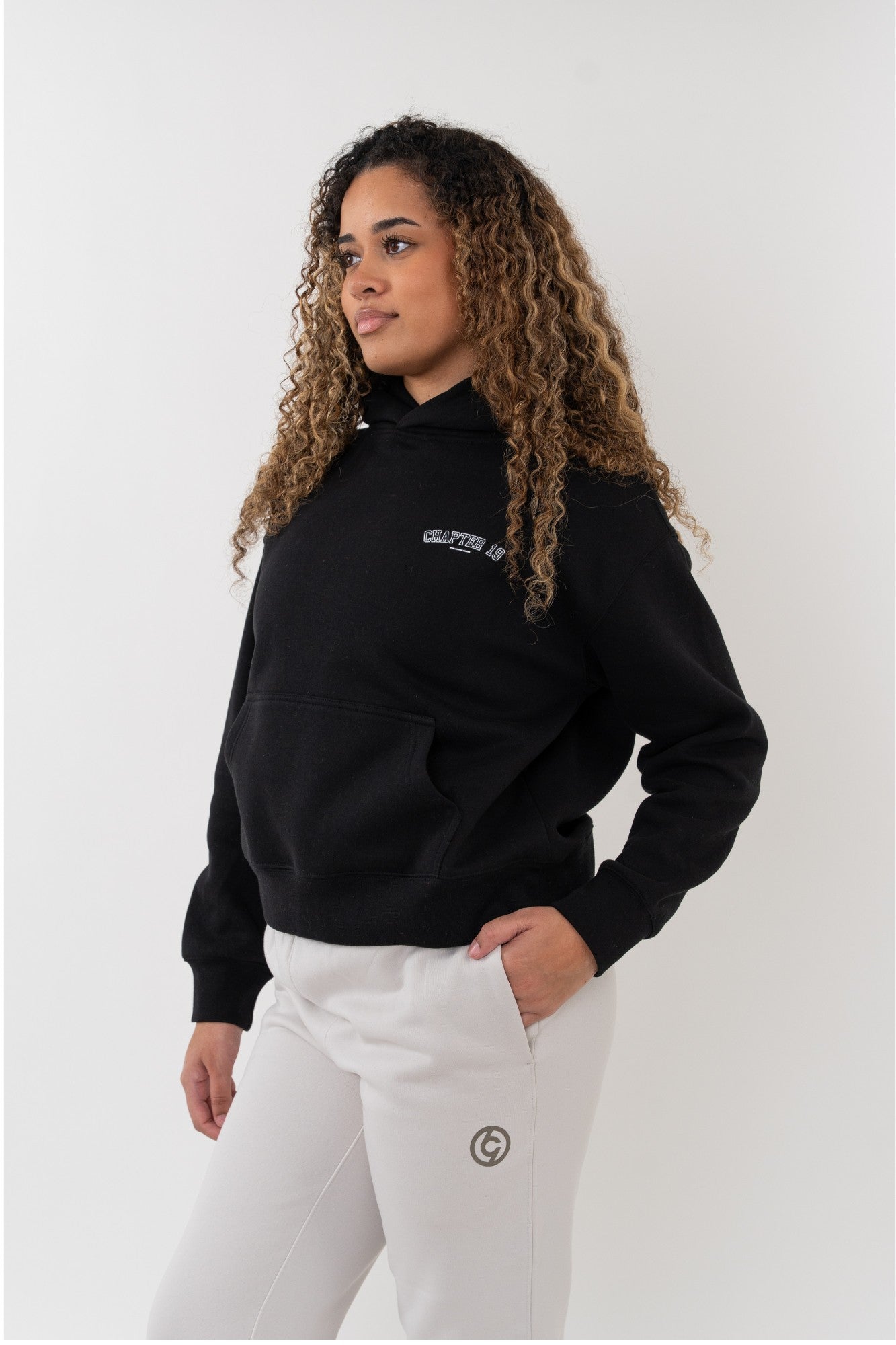 front view of black hoodie perfect for dancers and performers wanting streetwear look