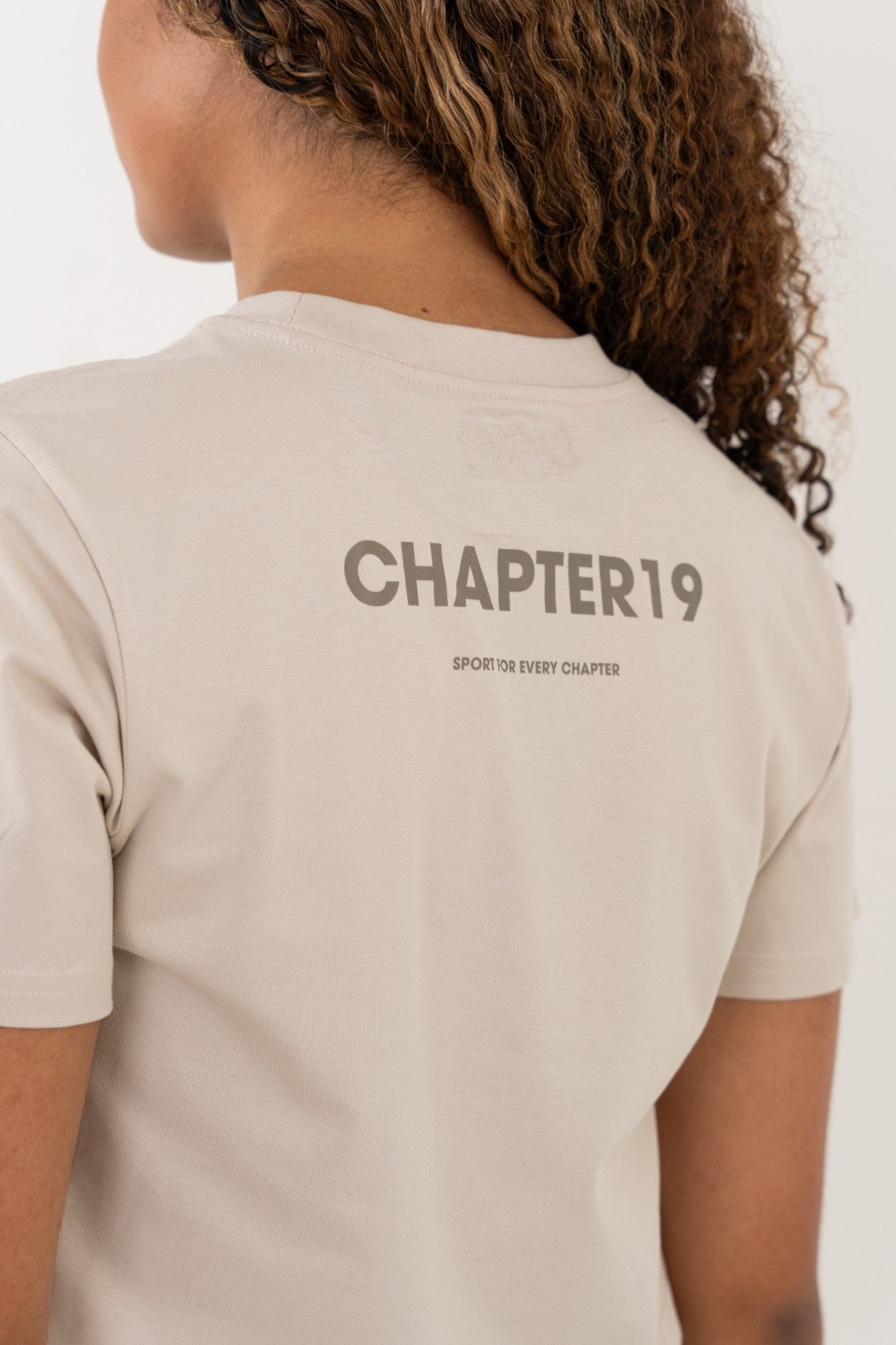 back view detail of bone cropped tshirt for female performers in the UK