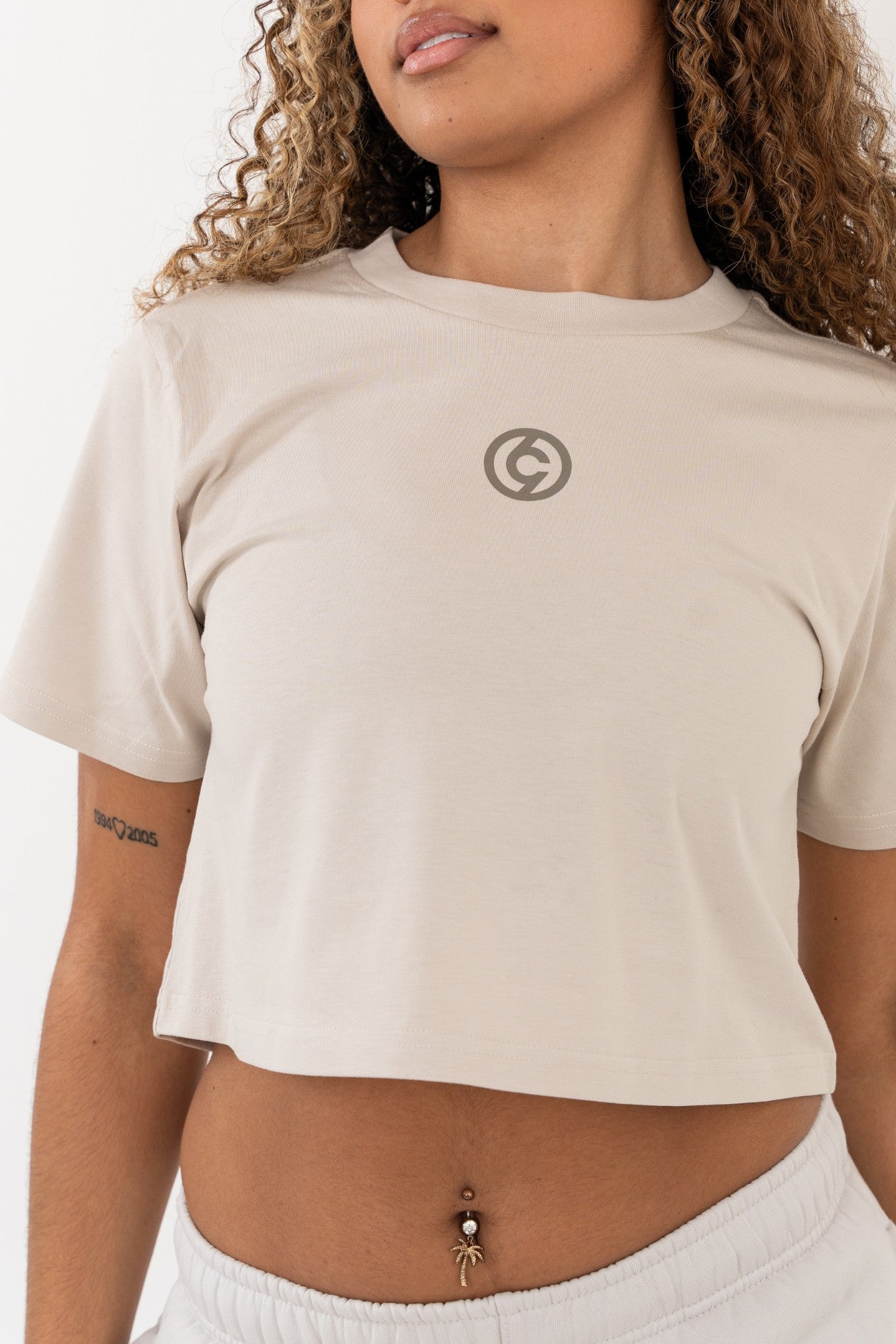 front detail of dancer in C19 cropped bone t-shirt